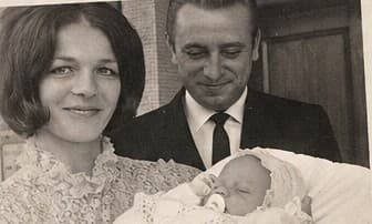 A family photograph: Paul's mother and father holding him as a baby
