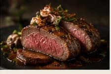 Sliced roast lamb with rosemary and jus