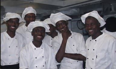 The Villa Paolo kitchen brigade in whites