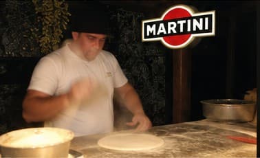 Paul at the pizza oven at Villa Paolo